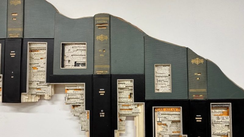 Brian Dettmer's "Memories of the Mountains" (detail), a sculptural installation commissioned for the Center for the Arts Grand Lobby. The work, made out of Virginia Quarterly Review books, depicts a mountain landscape.
