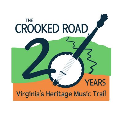The logo for The Crooked Road, depicting a green mountain with a crooked road winding down it towards an orange base. Navy blue text reads "The Crooked Road 20 Years Virginia's Heritage Music Trail". The zero in the 20 is represented with a navy blue and white banjo.