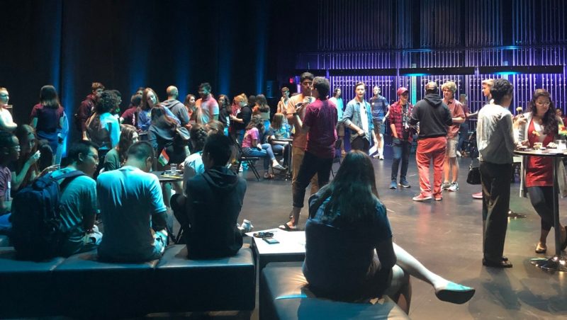  Students mingle on stage at the Moss Arts Center