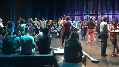  Students mingle on stage at the Moss Arts Center