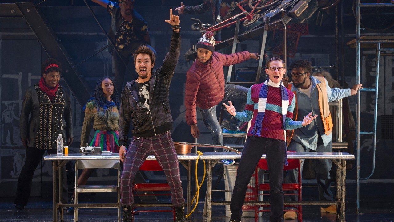  Cast members of "RENT" sing and dance on stage