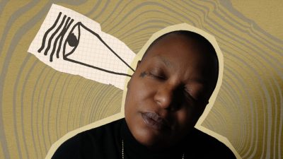 Musician Meshell Ndegeocello, a middle aged Black woman with short cropped natural hair wearing a black turtleneck and long gold chain. She closes her eyes and tilts her head gently to the right. The background is a tan and grey swirl, like tree rings, and an eye drawn on graph paper points away from her right ear.
