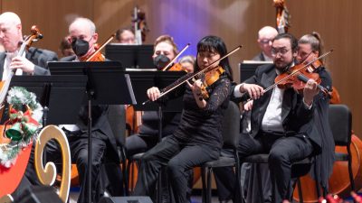  The Roanoke Symphony Orchestra performs its annual "Holiday Pops Spectacular" at the Moss Arts Center. In the foreground is part of the string section.