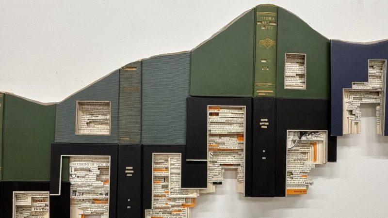 Brian Dettmer's "Memories of the Mountains" (detail), a sculptural installation commissioned for the Center for the Arts Grand Lobby. The work, made out of Virginia Quarterly Review books, depicts a mountain landscape.