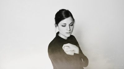 Composer Molly Joyce, a white woman with dark hair, who performs with the Music Inclusion Ensemble