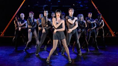 Velma Kelly leads a group of dancers during a performance of "Chicago."