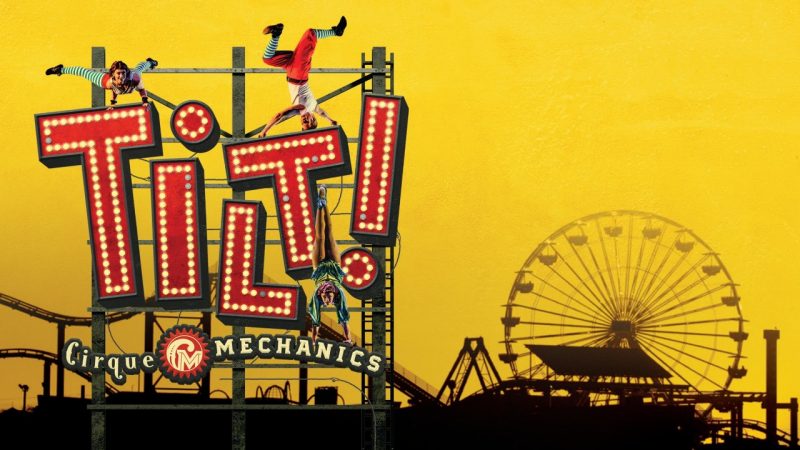 The graphic for Cirque Mechanic's "Tilt: A Circus Thrill Ride," showing the silhouette of a theme park against a yellow background. The word "Tilt!" is shown in red marquee lettering above the Cirque Mechanics logo
