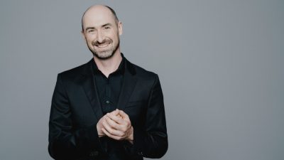 Irish Baroque Orchestra Artistic Director Peter Whelan, a bald white man with a dark brown beard.